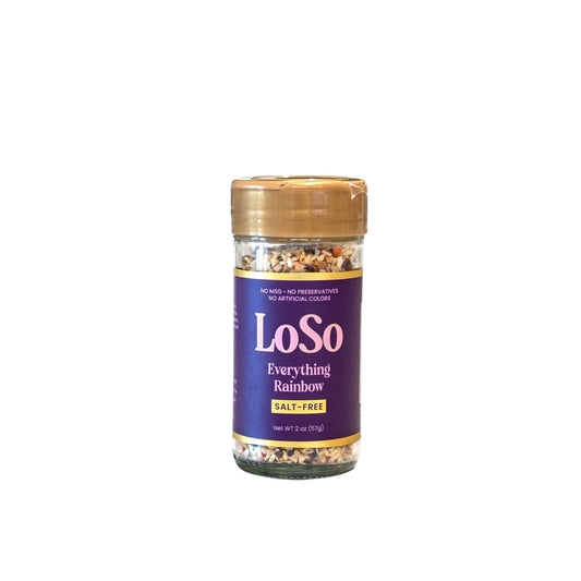LoSo Everything Rainbow salt-free seasoning blend with seeds, citrus peels, and alliums in a glass jar.